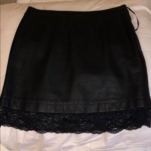 Leather skirt. Lace detailing.